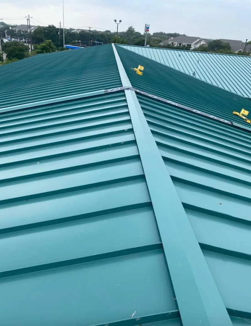 Green commercial metal roof ridge and valley for Metal Roof Repair in Broadview Park